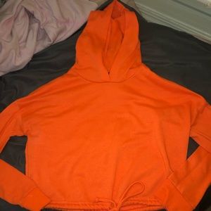 neon orange crop tie hoodie